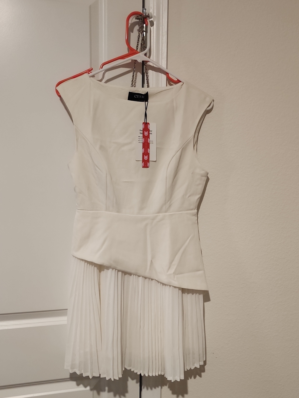 Cider White Sleeveless Asymmetric Pleated Mini Dress